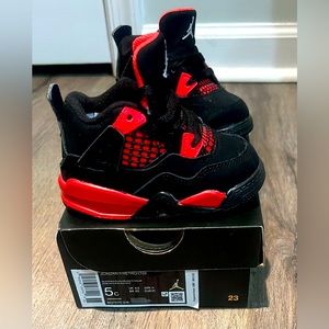 Infant - size 5C - Air Jordan 4 “Red Thunder”